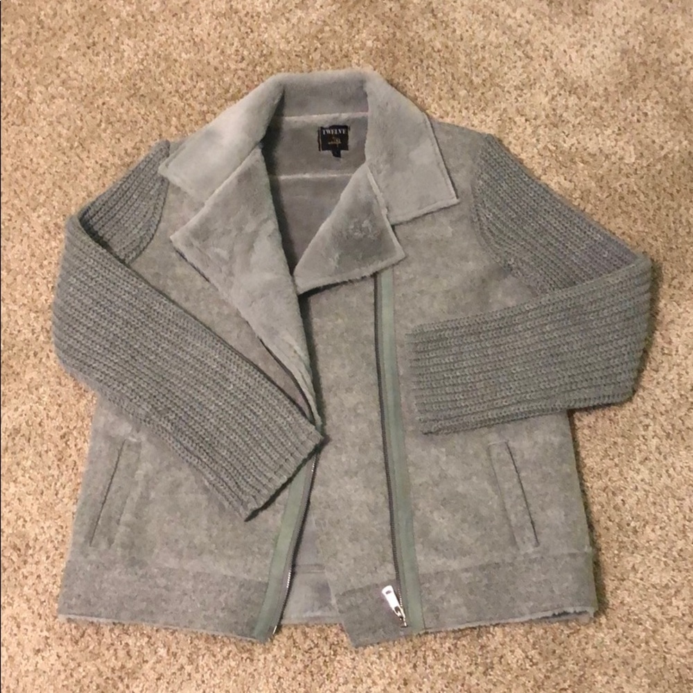 Warm Jacket with Knit sleeves and fur inside.